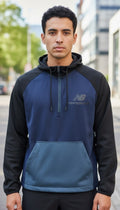 Off The Rails IOM New Balance men's navy and black colour-blocked quarter-zip anorak windbreaker with hood